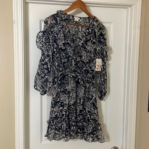 Shoshanna black and white floral dress. Size 2. Fully lined, with ruffles